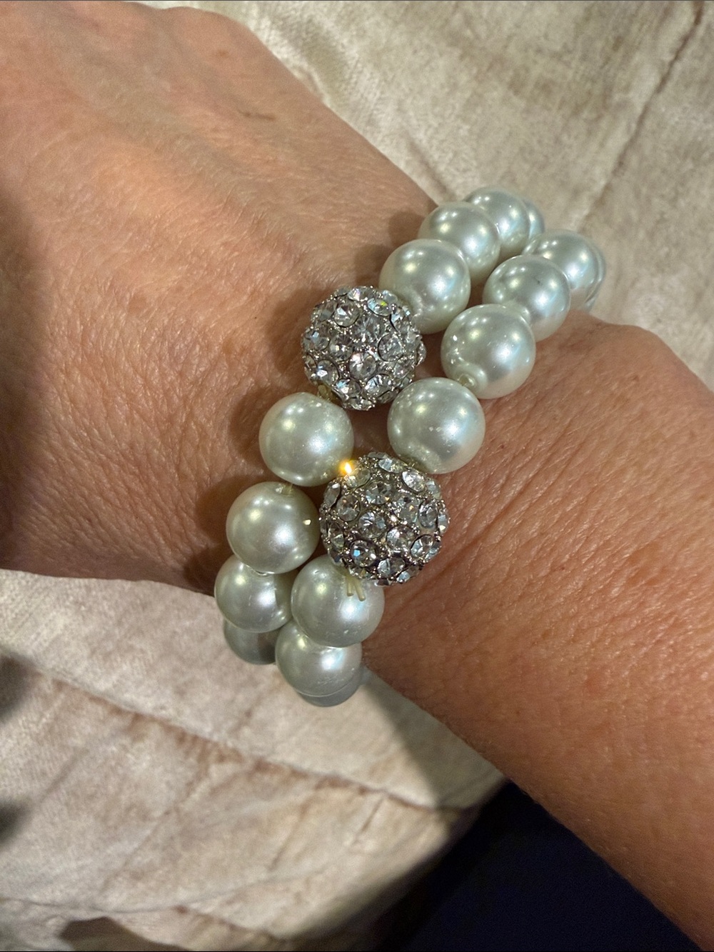 Set of two faux pearl stretch bracelets with crystal rondel